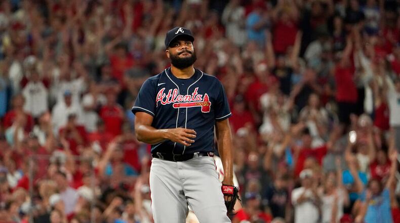 Atlanta Braves relief pitcher Kenley Jansen reacts after giving up a bases-loading walk to St. Louis Cardinals' Tyler O'Neill, scoring Paul Goldschmidt to give the Cardinals a 6-5 victory in a baseball game Saturday, Aug. 27, 2022, in St. Louis. (AP Photo/Jeff Roberson)