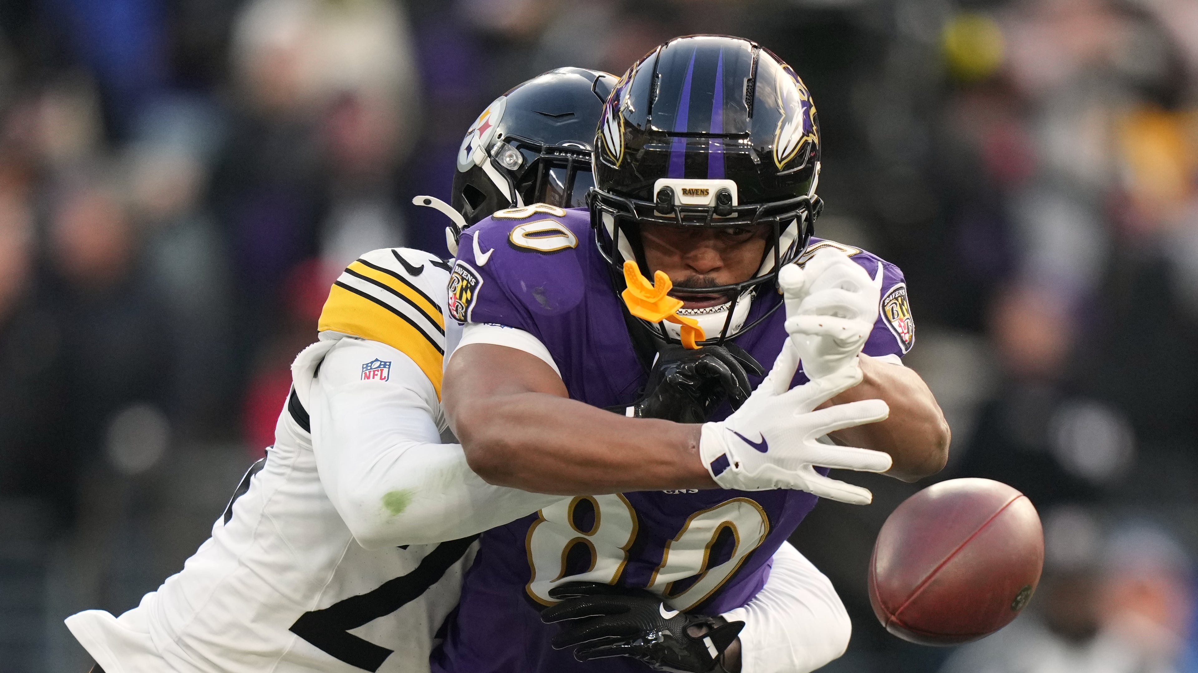Pittsburgh Steelers cornerback Joey Porter Jr. (24) breaks up a pass intended for Baltimore Ravens tight end Isaiah Likely (80) during the second half of an NFL football game, Sunday, Dec. 7, 2025, in Baltimore. (AP Photo/Stephanie Scarbrough)