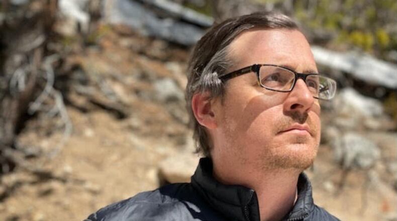 C. Matthew Smith of Newnan is an Atlanta attorney whose first novel covers a violent manhunt in the wilderness.