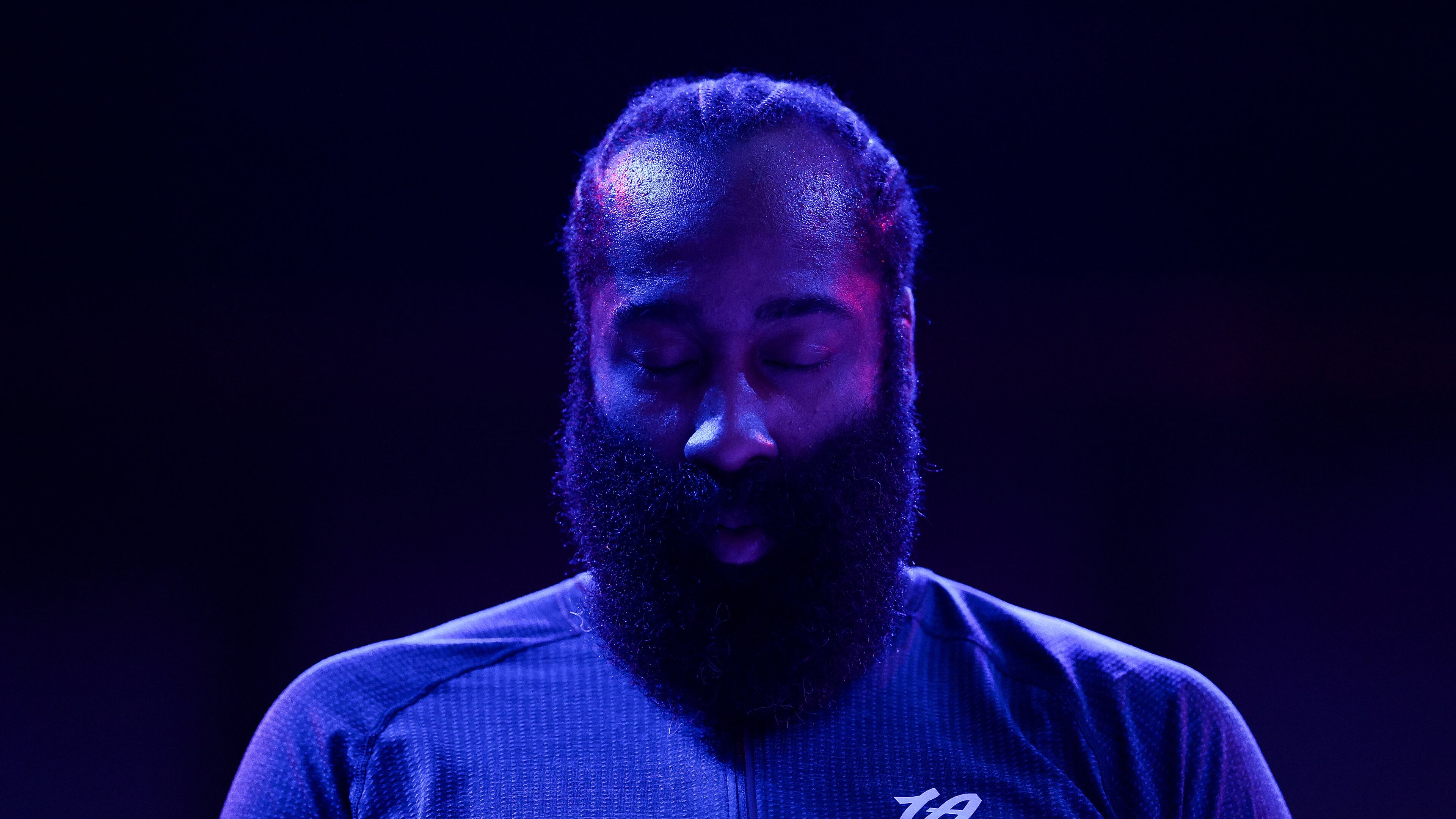 Los Angeles Clippers guard James Harden (1) stands during the national anthem before an NBA basketball game against the Minnesota Timberwolves Saturday, Dec. 6, 2025, in Minneapolis. (AP Photo/Matt Krohn)