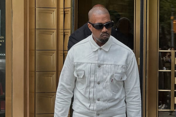 Ye, the rapper formerly known as Kanye West, leaves federal court during the trial of Sean "Diddy" Combs in New York, Friday, June 13, 2025. (AP Photo/Michael R. Sisak)
