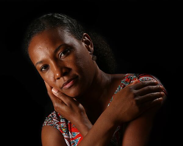 At the first reconciliation meeting, Latysha Cameron talked about how young black children in schools were labeled troublemakers and disciplined at higher rates than white children.    Curtis Compton/ccompton@ajc.com