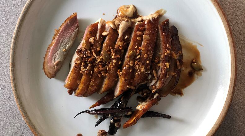 Lazy Betty’s dry-aged duck.
Wendell Brock for The Atlanta Journal-Constitution