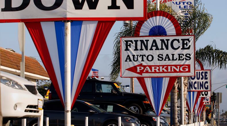 House Bill 340 has produced a battle between the lobby groups for new-car and used-car dealers. (Gary Friedman/Los Angeles Times/TNS)