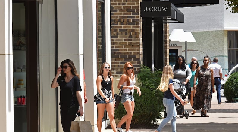 Avalon, a mixed-use development in Alpharetta, received nearly $2.6 million in property tax breaks last year. Customers visit Avalon’s theater, restaurants and stores on Thursday, August 17, 2017. HYOSUB SHIN / HSHIN@AJC.COM