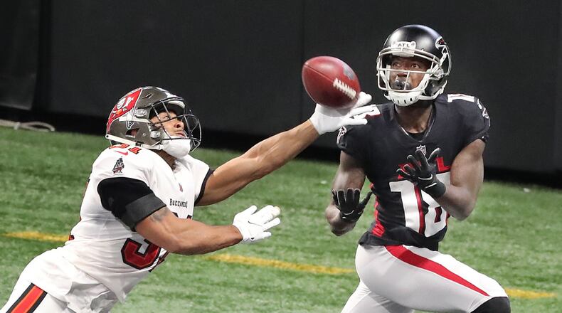 122020 Atlanta: Tampa Bay Buccaneers safety Antoine Winfield breaks up a Matt Ryan pass to Falcons wide receiver Calvin Ridley in the endzone during the 4th quarter in a NFL football game on Sunday, Dec. 20, 2020, in Atlanta.  ���Curtis Compton / Curtis.Compton@ajc.com���