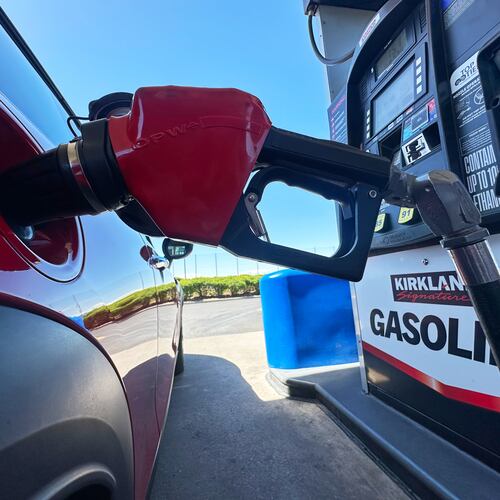FILE - A motorist fills up the tank of a vehicle at a Costco gasoline station Wednesday, April 15, 2026, in Sheridan, Colo. (AP Photo/David Zalubowski, file)