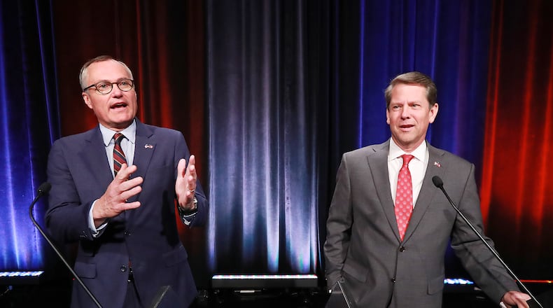Lt. Gov. Casey Cagle and Secretary of State Brian Kemp, the two remaining Republicans in the race for Georgia governor, at last week’s Atlanta Press Club debate. Curtis Compton/ccompton@ajc.com