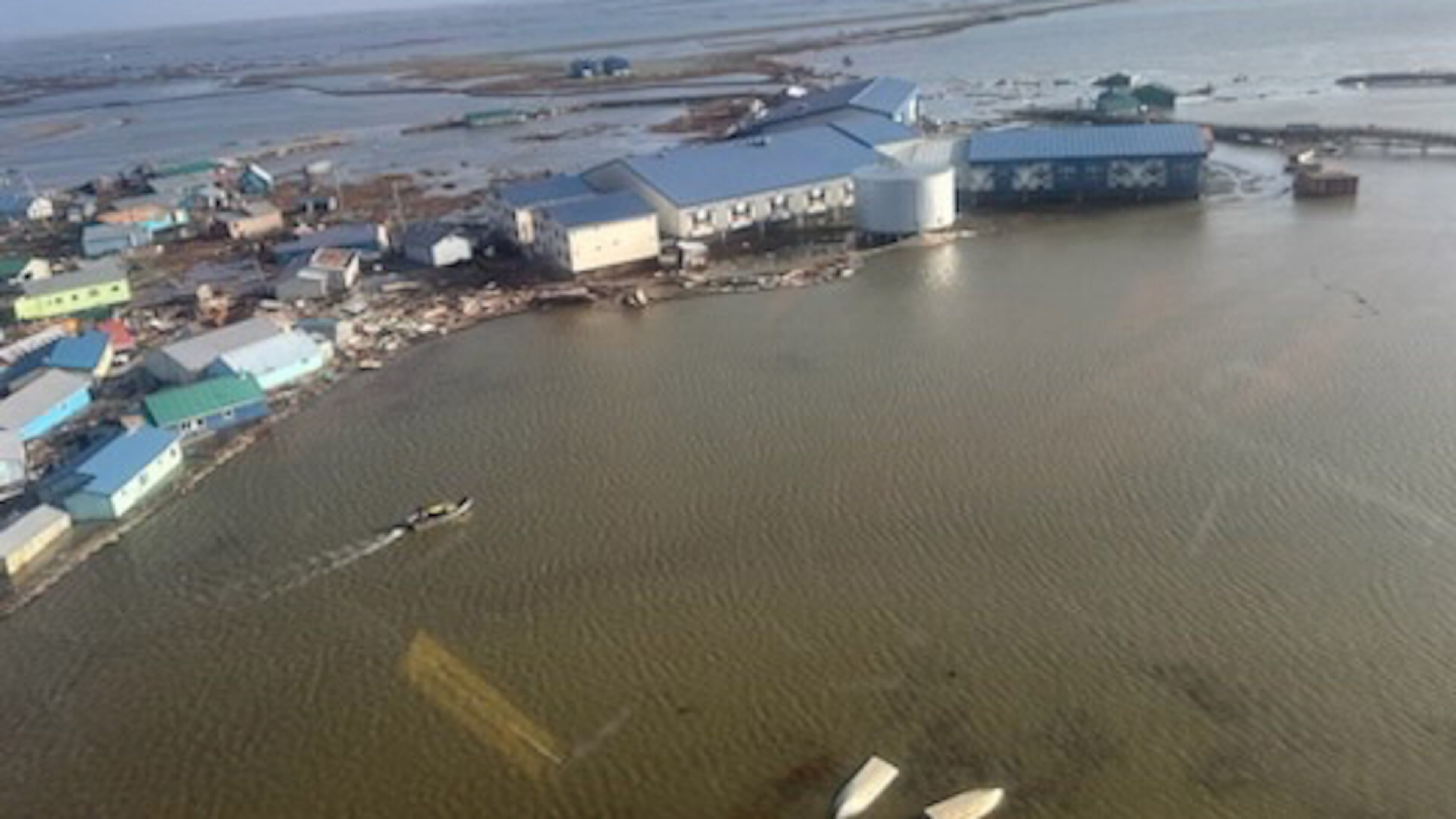 In this photo provided by the U.S. Coast Guard, Kipnuk, Alaska, experiences coastal flooding, Sunday, Oct. 12, 2025. (U.S. Coast Guard via AP)