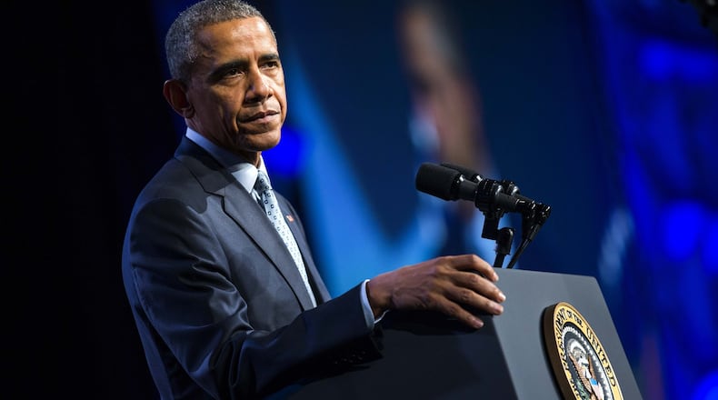 President Barack Obama commuted 214 sentences for federal inmates on Wednesday.