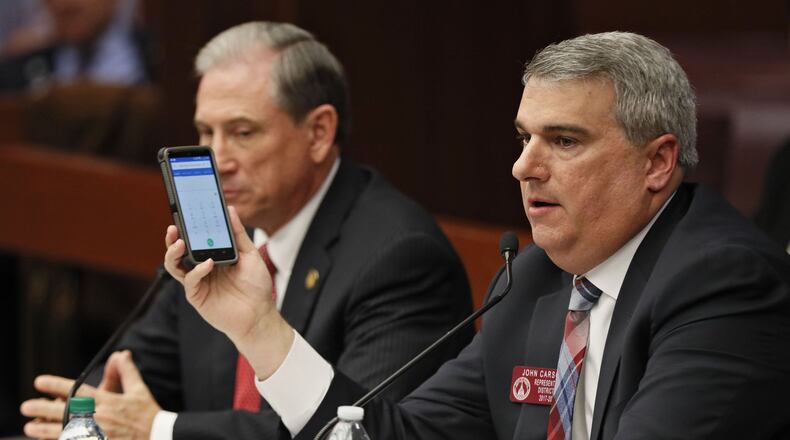 Georgia state representative John Carson (right), R - Marietta, along with Rep. Eddie Lumsden, R - Armuchee, presents HB 673 to the Senate Judiciary Committee. The bill addressed issues of distracted driving using hand held devices. BOB ANDRES /BANDRES@AJC.COM
