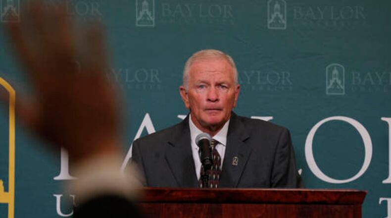 Baylor interim head football coach Jim Grobe talks with reporters during a news conference, Friday, June 3, 2016, in Waco, Texas. Grobe replaces former head coach Art Briles who was fired last week. (Rod Aydelotte/Waco Tribune Herald, via AP)
