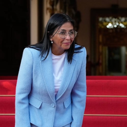 Venezuela's acting President Delcy Rodriguez smiles after bidding farewell to U.S. Energy Secretary Chris Wright following their meeting at Miraflores Palace in Caracas, Venezuela, Wednesday, Feb. 11, 2026. (AP Photo/Ariana Cubillos)
