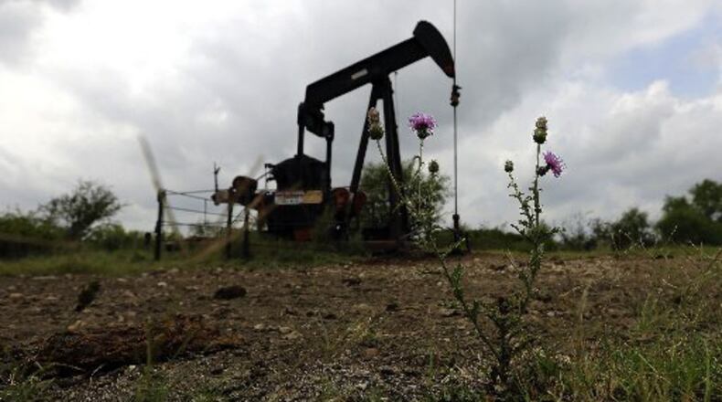 An oil well pump jack in South Texas. (AP Photo/Eric Gay)