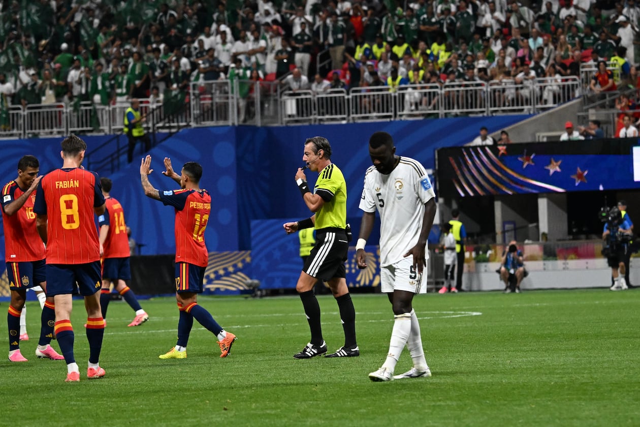 Saudi Arabia's Hassan Al-Tambakti walks off the field as Spain celebrates its 4-0 win in the World Cup at Atlanta Stadium on Sunday, June 21, 2026. (Hyosub Shin/AJC)