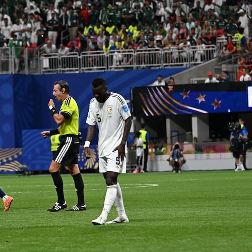 Saudi Arabia's Hassan Altambakti walks off field as Spain celebrates their 4-0 win in Group H FIFA World Cup match at Atlanta Stadium (Mercedes-Benz Stadium) on Sunday, June 21, 2026. (Hyosub Shin/AJC)
