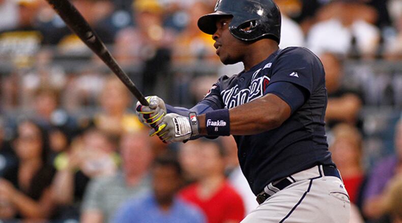 Justin Upton hits a RBI single in the first inning of Wednesday's 3-2 loss in Pittsburgh.