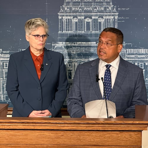 Minnesota Attorney General Keith Ellison, right, speaks during a news conference as Hennepin County Attorney Mary Moriarty looks on, Tuesday, Aug. 18, 2026, in St. Paul, Minn. (AP Photo/Mark Vancleave)