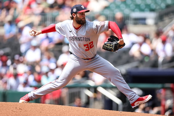 Washington Nationals pitcher Trevor Williams (32) delivers in the first inning of a baseball game against the Atlanta Braves, Thursday, May 15, 2025, in Atlanta. (AP Photo/Colin Hubbard)