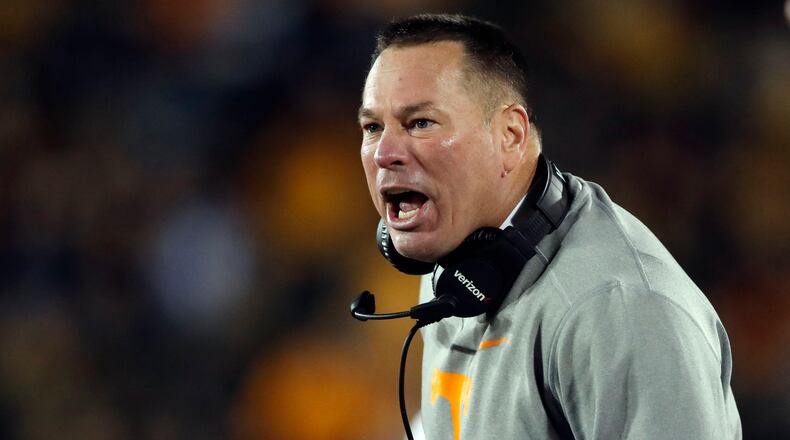 Tennessee head coach Butch Jones yells from the sideline during the first half of an NCAA college football game against Missouri, Saturday, Nov. 11, 2017, in Columbia, Mo. (AP Photo/Jeff Roberson)