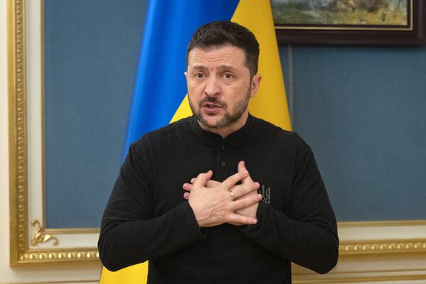 Ukrainian President Volodymyr Zelenskyy speaks during a briefing in Kyiv, Ukraine, Tuesday, March 25, 2025. (AP Photo/Efrem Lukatsky)