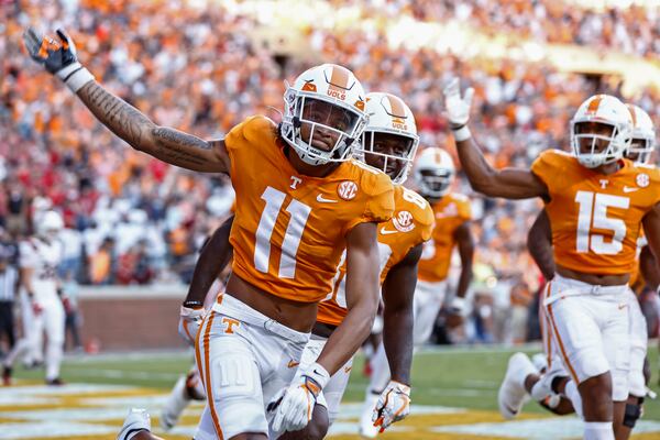 Tennessee wide receiver Jalin Hyatt (11) celebrates his touchdown against Ball State during the first half of an NCAA college football game Thursday, Sept. 1, 2022, in Knoxville, Tenn. (AP Photo/Wade Payne)