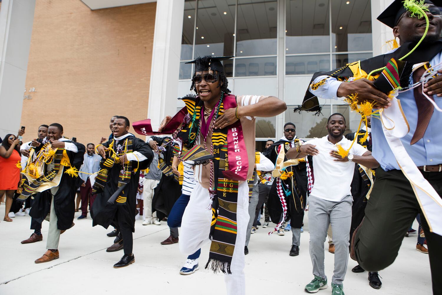 Members of Alpha Phi Alpha fraternity perform a step routine after the Morehouse College commencement ceremony on Sunday, May 21, 2023, on Century Campus in Atlanta. The graduation marked Morehouse College's 139th commencement program. CHRISTINA MATACOTTA FOR THE ATLANTA JOURNAL-CONSTITUTION