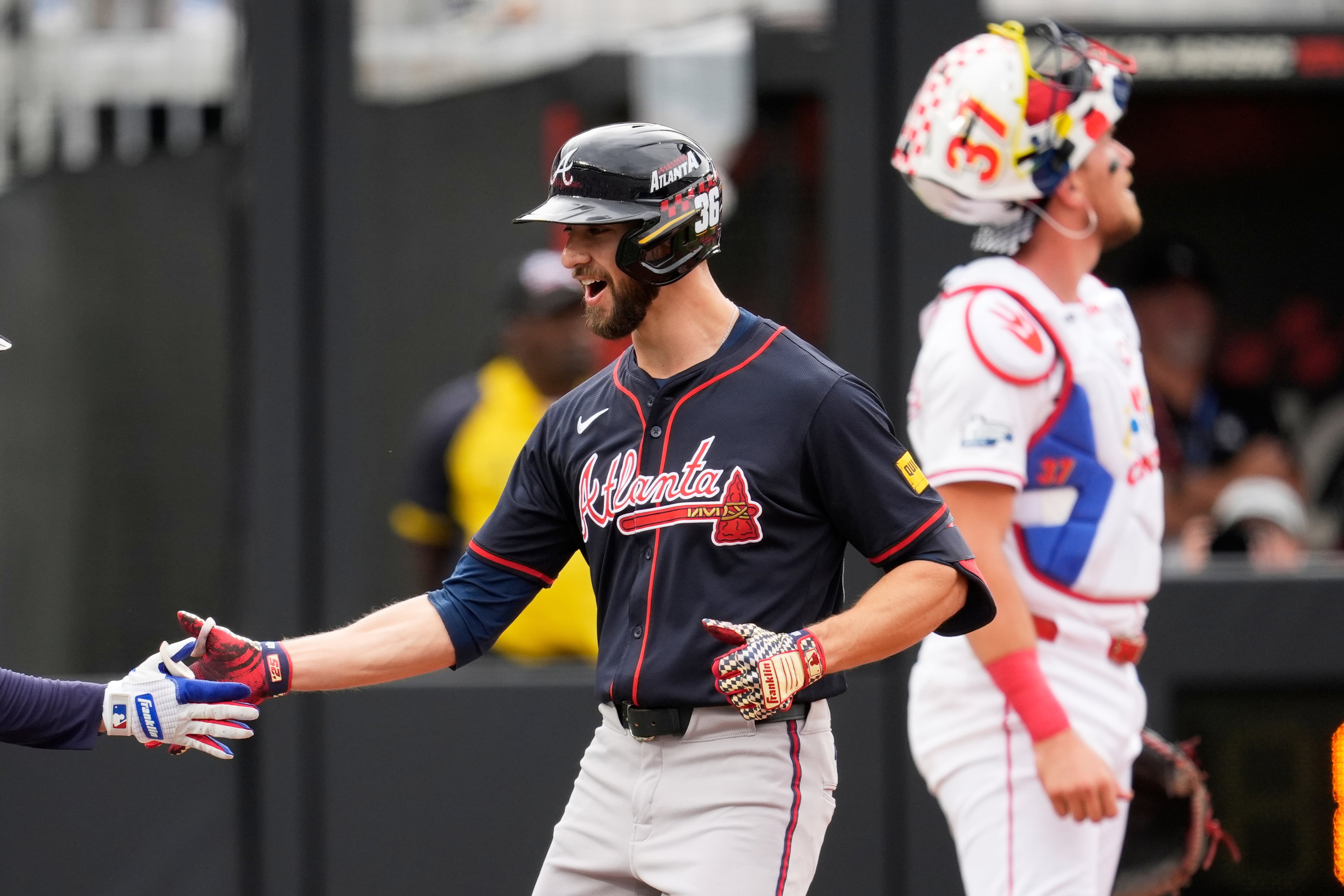 The Atlanta Braves' Eli White celebrates his second-inning home run against the Cincinnati Reds on Sunday, Aug. 3, 2025, during the MLB Speedway Classic at Bristol Motor Speedway in Bristol, Tenn. (George Walker IV/AP)