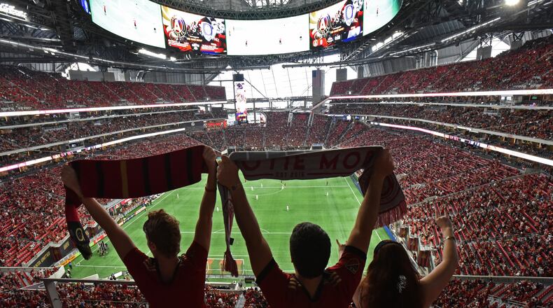 September 16, 2017 Atlanta - Atlanta United fans cheer for their team before an MLS soccer match against the Orlando City SC on Saturday, September 16, 2017. HYOSUB SHIN / HSHIN@AJC.COM