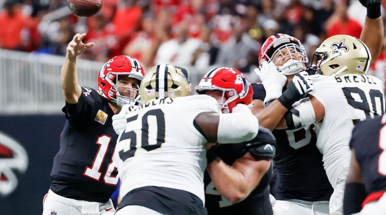 Atlanta Falcons quarterback Kirk Cousins (18) attempts a pass during the second half of an NFL football game against the New Orleans Saints on Sunday, Sept. 29, at Mercedes-Benz Stadium in Atlanta.
(Miguel Martinez/ AJC)