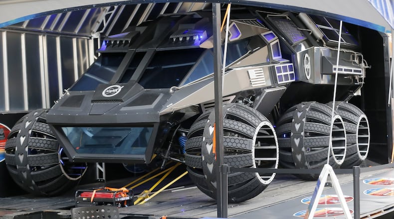 The Mars rover is 11 feet tall, 23 feet long and weigh 5,500 pounds. Could we deliver a vehicle this big to Mars? Yes, says astronaut Jon McBride.