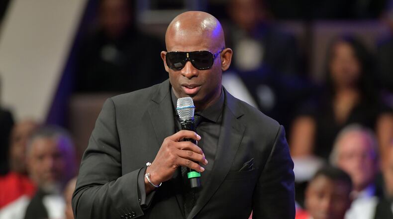 Former Falcons and Braves player Deion Sanders speaks during the Homegoing services for Bishop Eddie Long, senior pastor, at New Birth Missionary Baptist Church, Wednesday, January 25, 2017. Bishop Long died January 15th, after a long-time fight with cancer. He was 63. Hyosub Shin/AJC