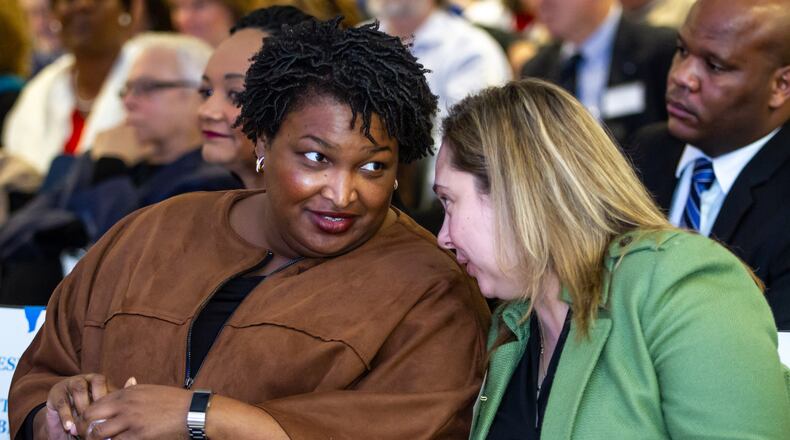 Stacey Abrams, left, talks with Sarah Riggs Amico, the former candidate for lieutenant governor, at last month’s state Democratic conventionSTEVE SCHAEFER / SPECIAL TO THE AJC