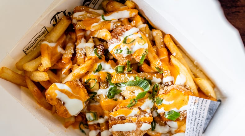 You can get loaded shrimp fries from A Little Nauti food truck.