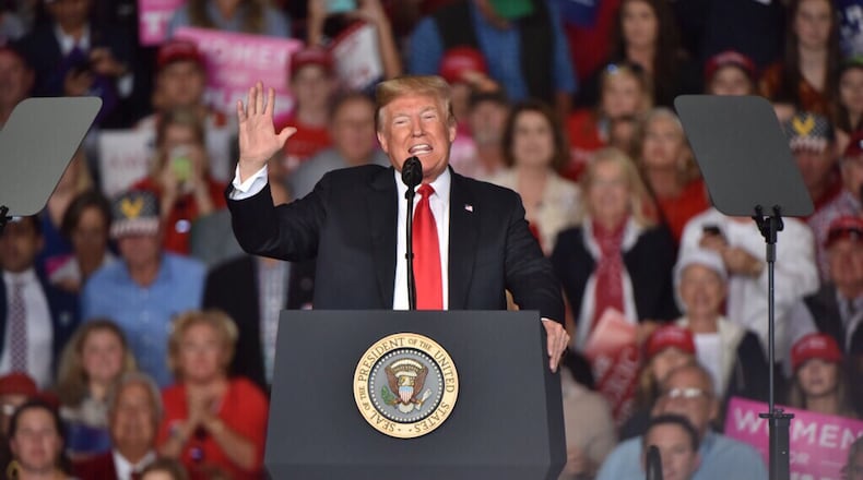 President Donald Trump rallies a crowd in Macon. AJC/Hyosub Shin.