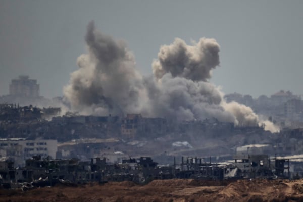 Smoke rises to the sky after an explosion in the Gaza Strip as seen from Sderot, southern Israel, Thursday, May 22, 2025. (AP Photo/Leo Correa)