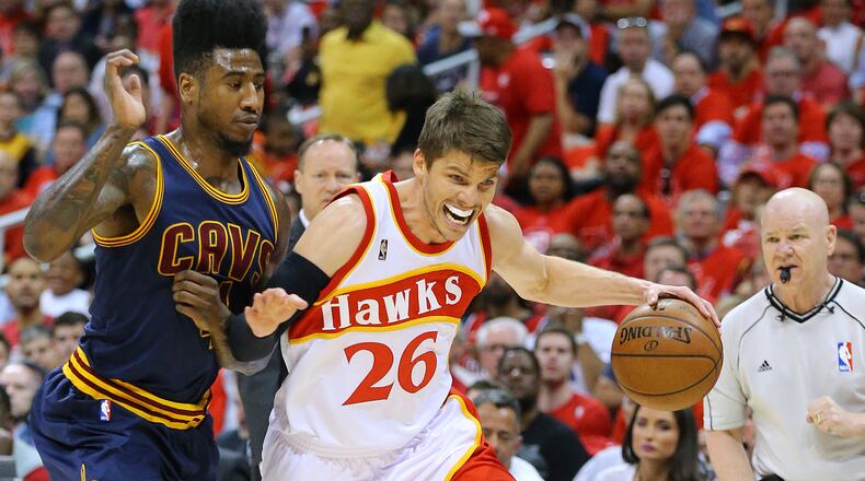 052215 ATLANTA: Hawks Kyle Korver drives against Cavaliers Iman Shumpert in game 2 of the Eastern Conference Finals on Friday, May 22, 2015, in Atlanta. Curtis Compton / ccompton@ajc.com