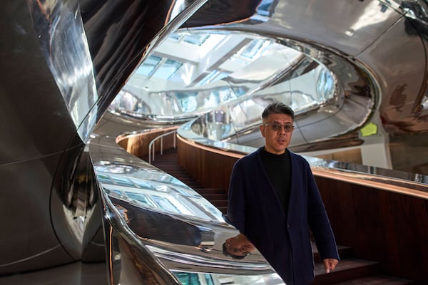 Architect Ma Yansong poses for a portrait during a press preview at the Fenix Migration Museum in Rotterdam, Netherlands, Wednesday, May 14, 2025. (AP Photo/Peter Dejong)