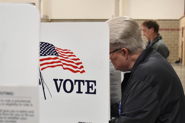 FILE - A voter fills out a ballot at the MetraPark events center, June 4, 2024, in Billings, Mont. (AP Photo/Matthew Brown, FIle)