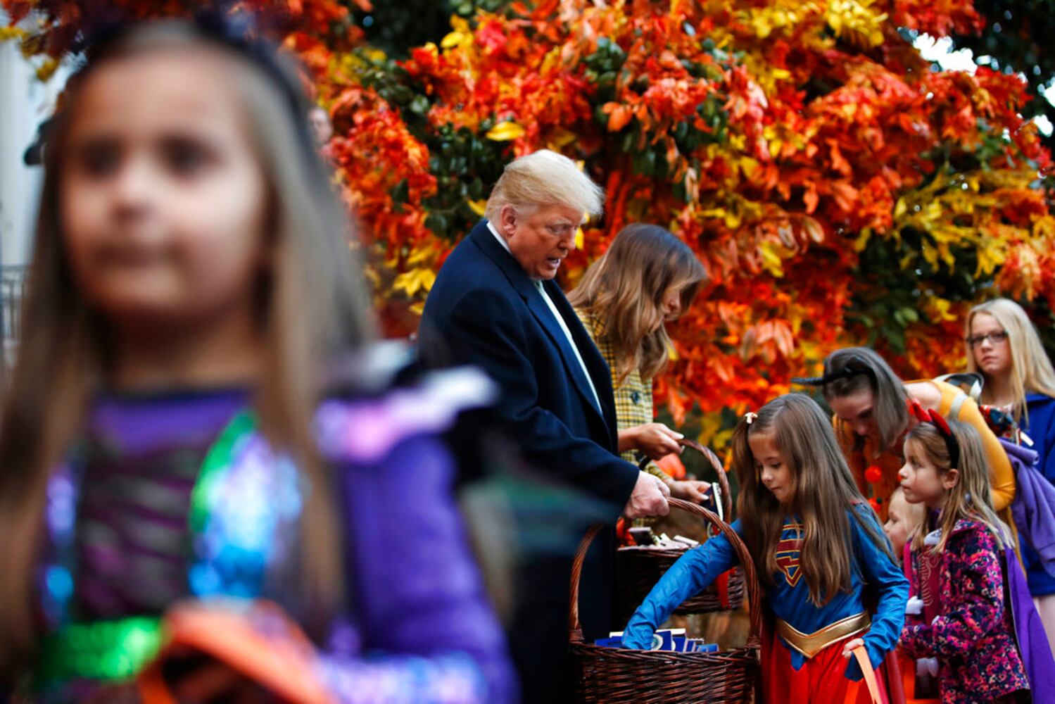 Photos: President Trump, first lady Melania Trump welcome children to White House for Halloween