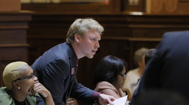 Rep. Matt Gurtler, R-Tiger, speaks with fellow lawmakers Wednesday, Feb. 15, 2017 in the Georgia House of Representatives. BOB ANDRES / BANDRES@AJC.COM