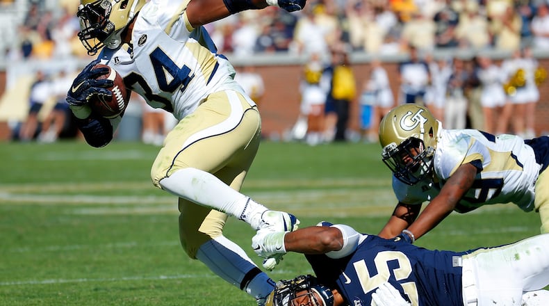 ATLANTA, GA - OCTOBER 17: Marcus Marshall #34 of the Georgia Tech Yellow Jackets is tackled by Pat Amara #25 of the Pittsburgh Panthers at Bobby Dodd Stadium on October 17, 2015 in Atlanta, Georgia. (Photo by Kevin C. Cox/Getty Images)