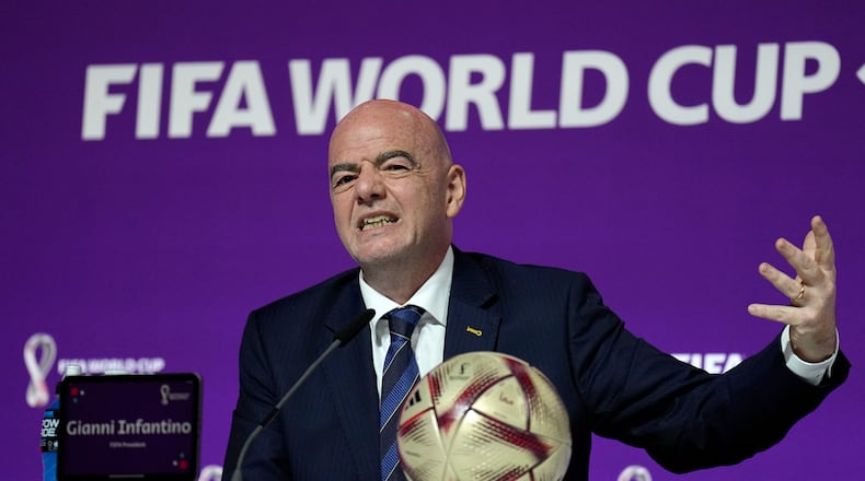 FILE - FIFA President Gianni Infantino gestures as he meets the media at the FIFA World Cup closing press conference in Doha, Qatar, Friday, Dec. 16, 2022. (AP Photo/Martin Meissner, File)