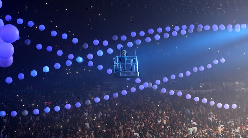 Drake takes a ride across Philips Arena. Photo: Robb Cohen Photography & Video /www.RobbsPhotos.com