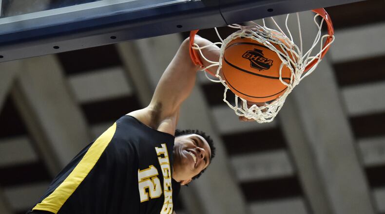 Oliver Gerard (Alcovy) dunks the ball during Slam Dunk Contest championship at the Macon Centreplex in Macon on Saturday, March 7, 2020. (Hyosub Shin / Hyosub.Shin@ajc.com)