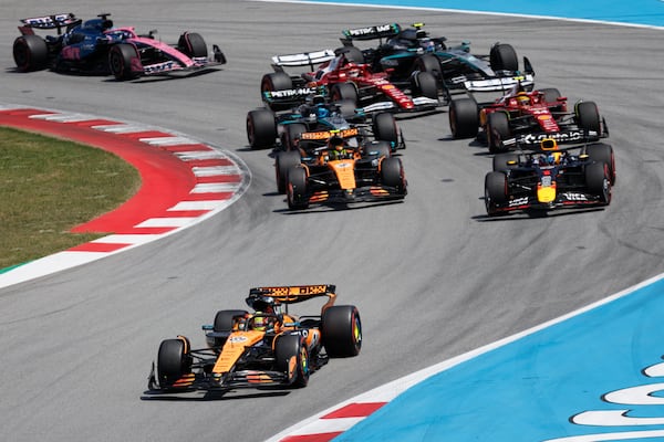 McLaren driver Oscar Piastri of Australia leads the field after the start the Spanish Grand Prix Formula One race at the Barcelona Catalunya racetrack in Montmelo, near Barcelona, Spain, Sunday, June 1, 2025. (AP Photo/Joan Monfort)