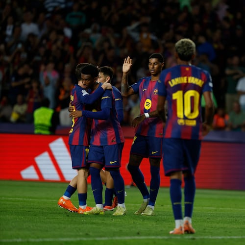 Barcelona's players celebrate the sixth goal of their team during the Champions League opening phase soccer match between Barcelona and Olympiacos in Barcelona, Spain, Tuesday, Oct. 21, 2025. (AP Photo/Joan Monfort)