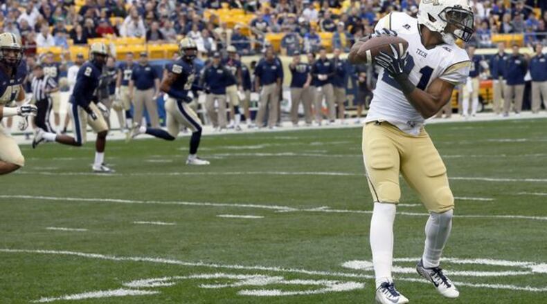 Georgia Tech is converting third downs (like this one, against Pitt, a 79-yard touchdown reception by Charles Perkins, at a higher rate than any team in the country, in part due to opponents' reluctance to blitz. (ASSOCIATED PRESS)