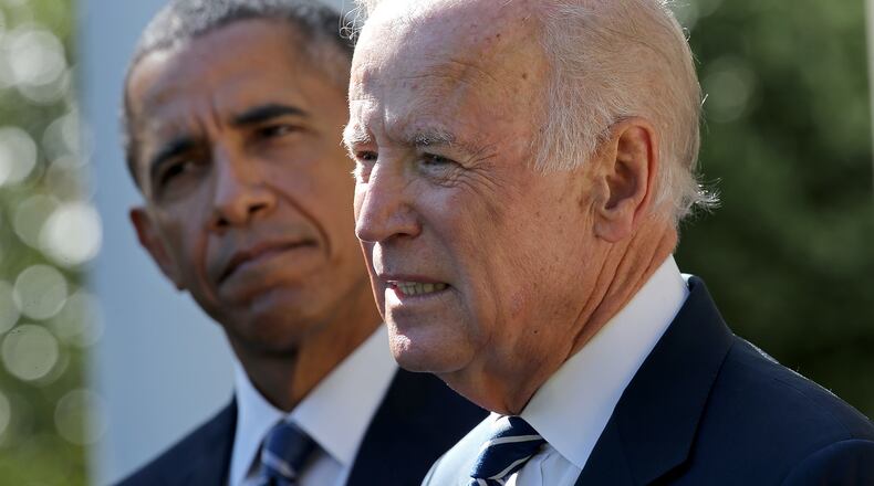 WASHINGTON, DC - OCTOBER 21: U.S. Vice President Joe Biden (R) announces that he will not seek the presidency during a statement with U.S. President Barack Obama in the Rose Garden of the White House October 21, 2015 in Washington, DC. Citing the death of his oldest child, Biden said he is closing the exploration process of mounting a campaign for the presidency, (Photo by Win McNamee/Getty Images)