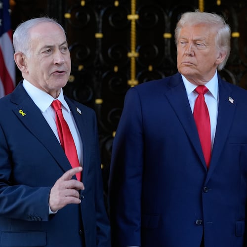 President Donald Trump listens as Israel's Prime Minister Benjamin Netanyahu speaks during an arrival at his Mar-a-Lago club, Monday, Dec. 29, 2025, in Palm Beach, Fla. (AP Photo/Alex Brandon)